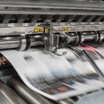 Press machine printing newspaper